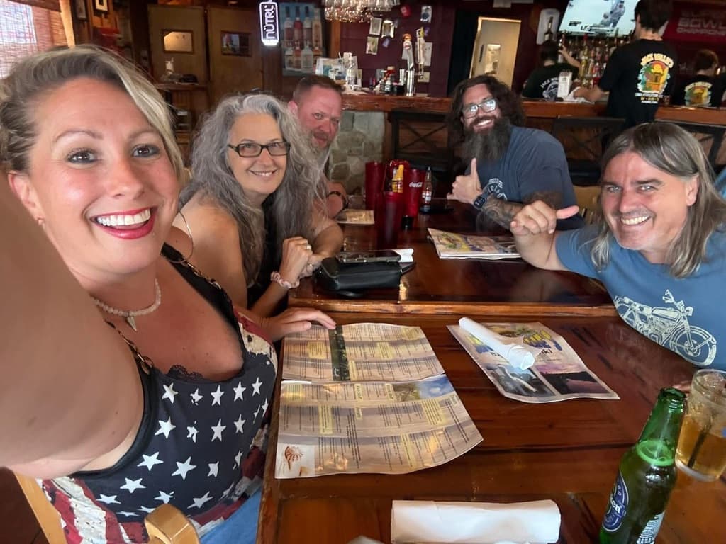 Adam Peters with business partners over dinner