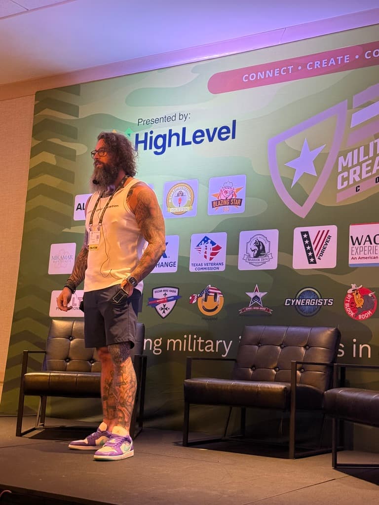 Adam Peters on the MCC main stage at the Dominate Entrepreneurial Summit, October 2025